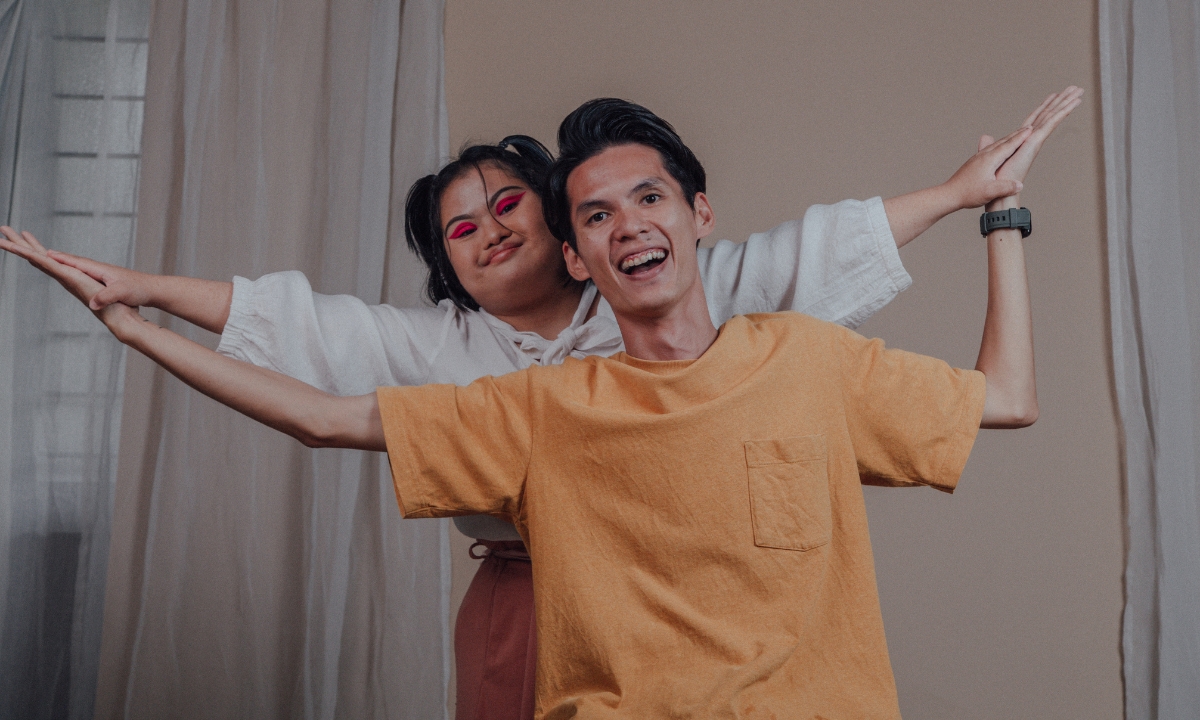 two people playing and dancing together